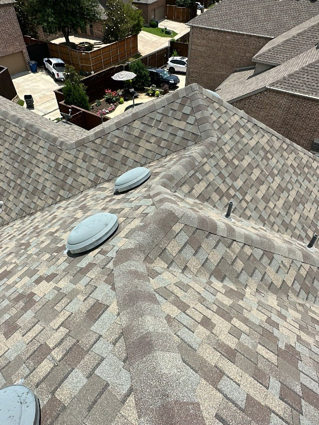 Image of a fully repaired roof taken by Michael Lance of MD roofing and construction