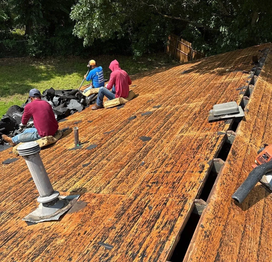 Image of a roof replacement in progress in prosper Texas performed by MD roofing and construction